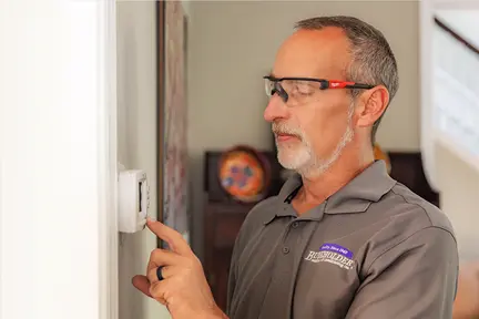 Burkholders HVAC Service Technician Thermostat